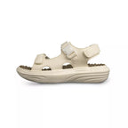 Beige sandal with strap on a white background