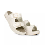 Pair of white sandals with buckles on a white background